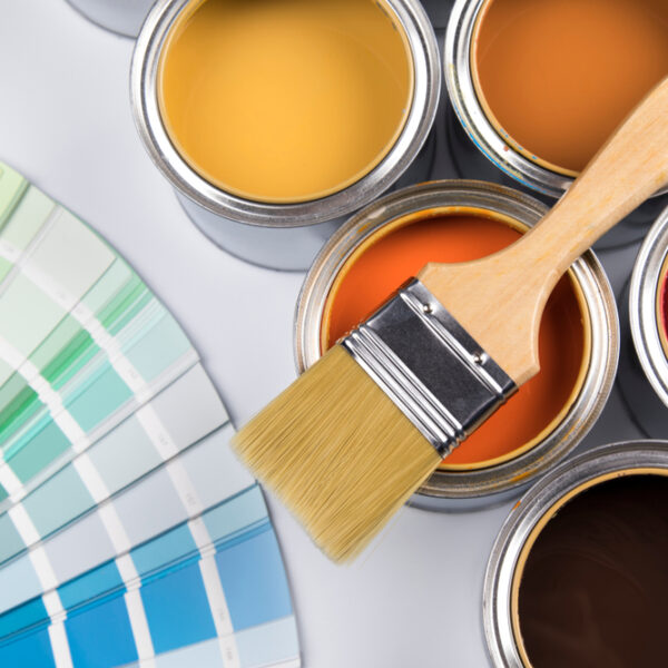 Tin,Cans,With,Paint,,Brushes,And,Bright,Palette,Of,Colors