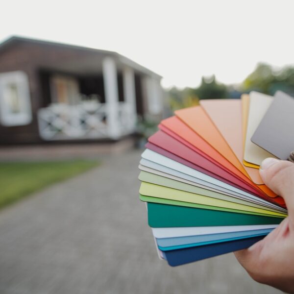 Close-up,Of,Man,Architect,Choosing,Samples,Of,House,Exterior,Paint.